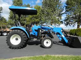 NEW HOLLAND TC26DA TRACTOR OPERATORS MANUAL